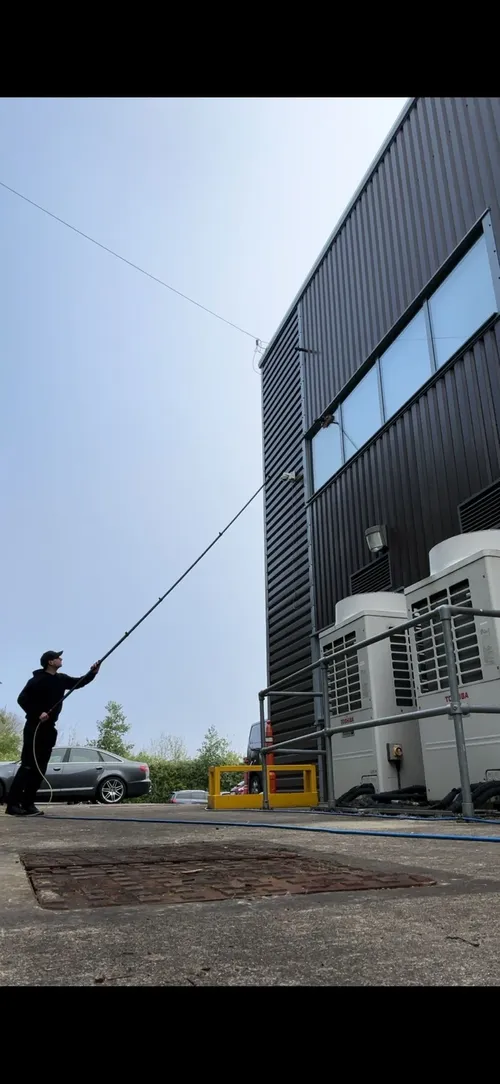 Safe'N'Clean cleaning the cladding of a large commercial unit from ground level
